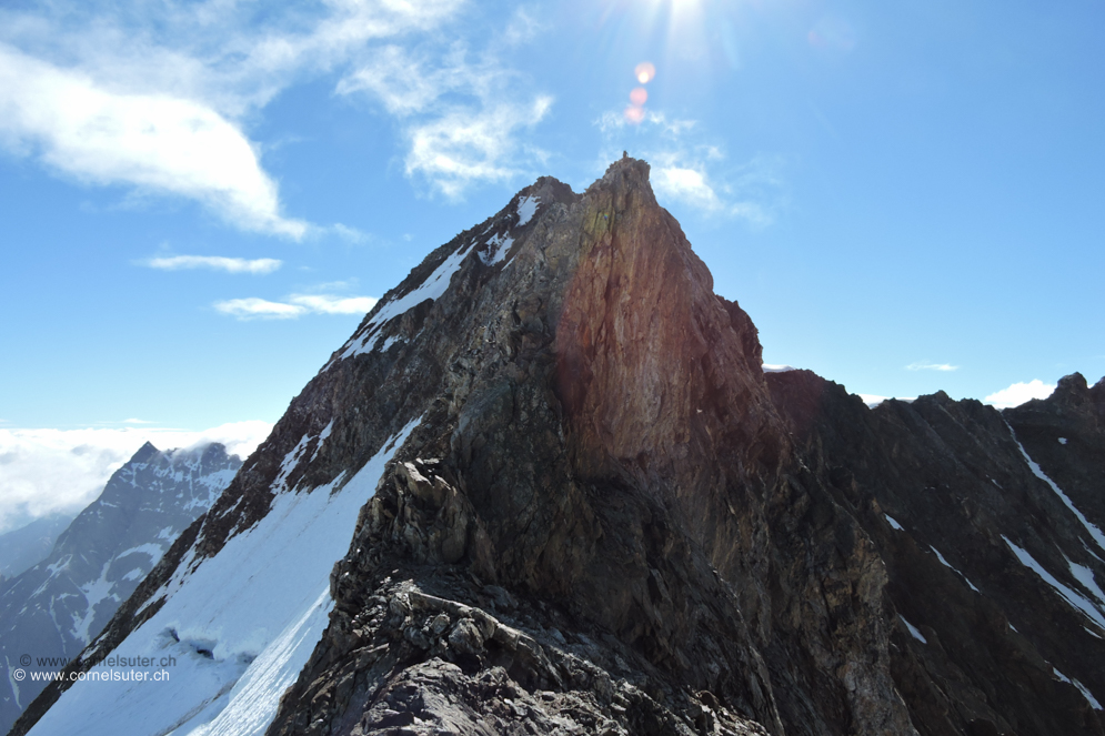 Ein Bergsteiger auf dem Turm.